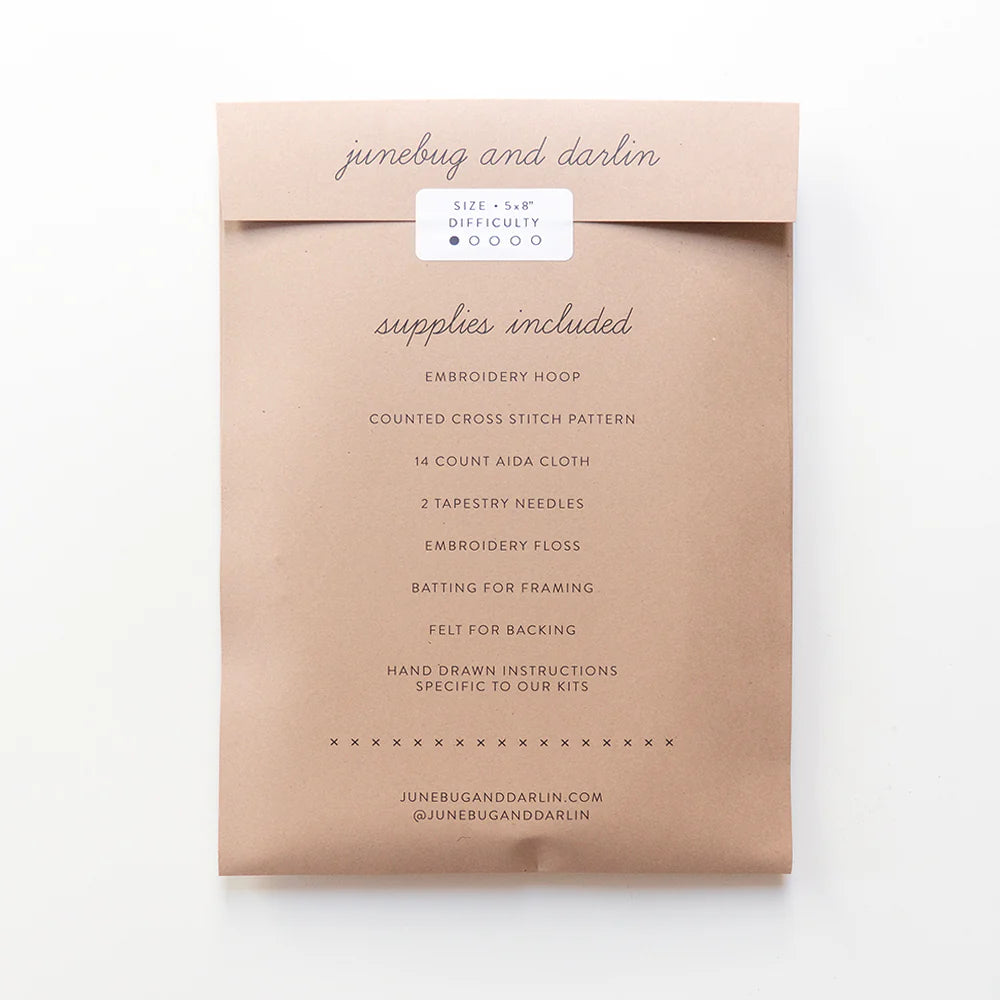 Kraft paper packaging with text detailing contents on a white background
